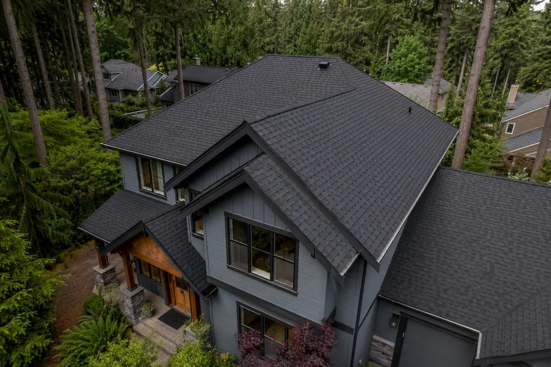 GAF Timberline HDZ shingles in Charcoal on a modern gray home