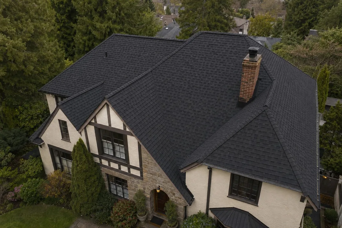 CertainTeed Landmark shingles in Cinder Black on a Tudor-style home